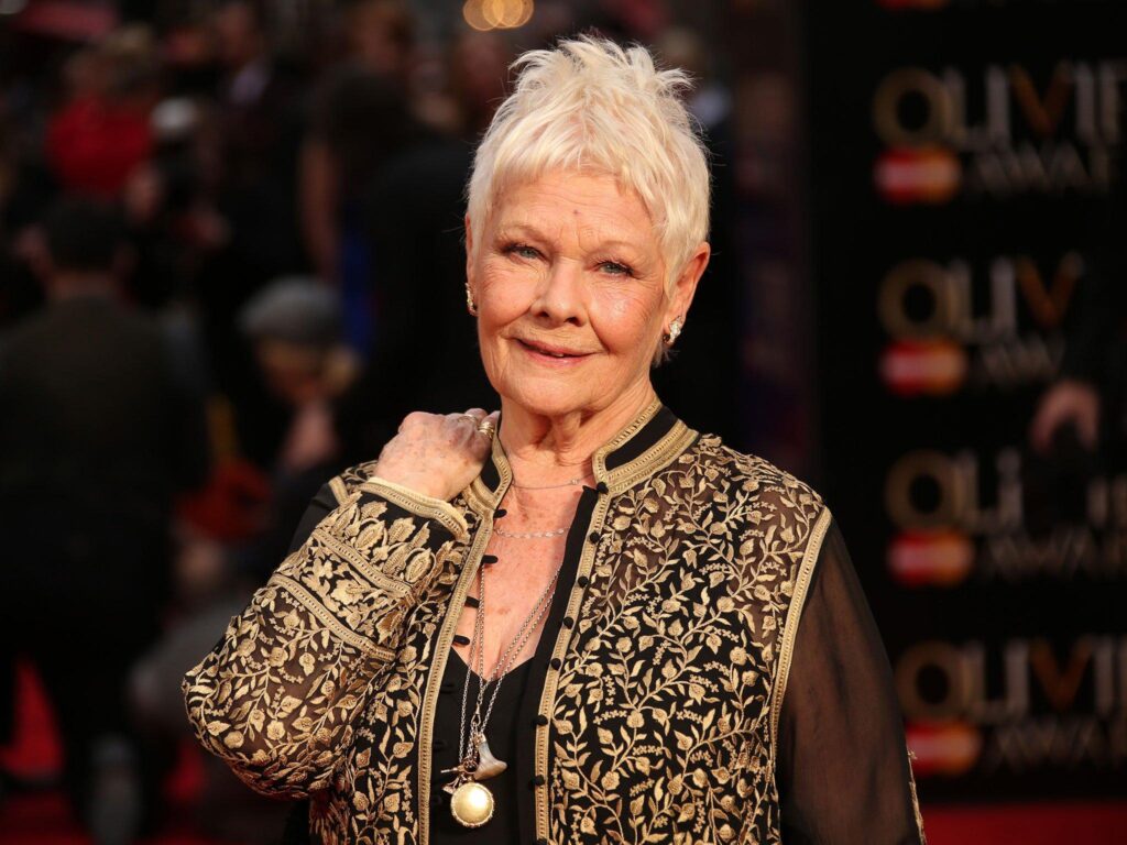 Bow down to Dame Judi Dench the octogenarian on tattoos, rapping