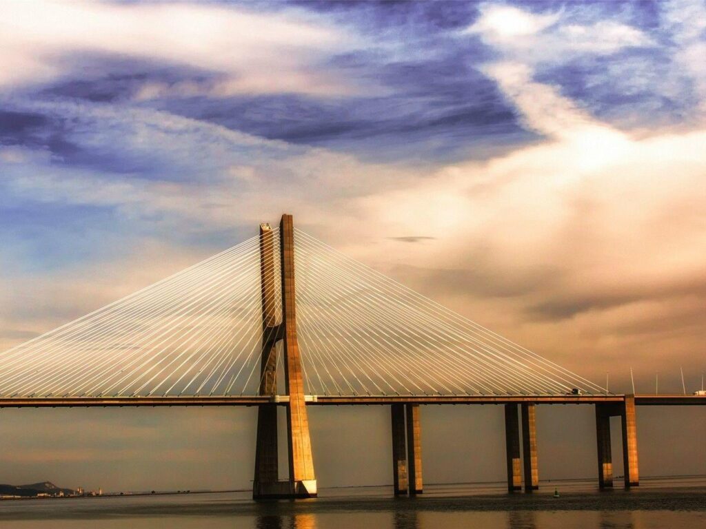 Modern bridge on the river tagus in lisbon wallpapers
