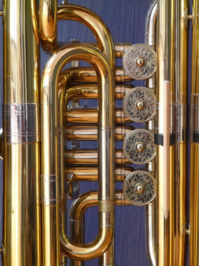 Stainless steel and brass wind instrument free Wallpaper