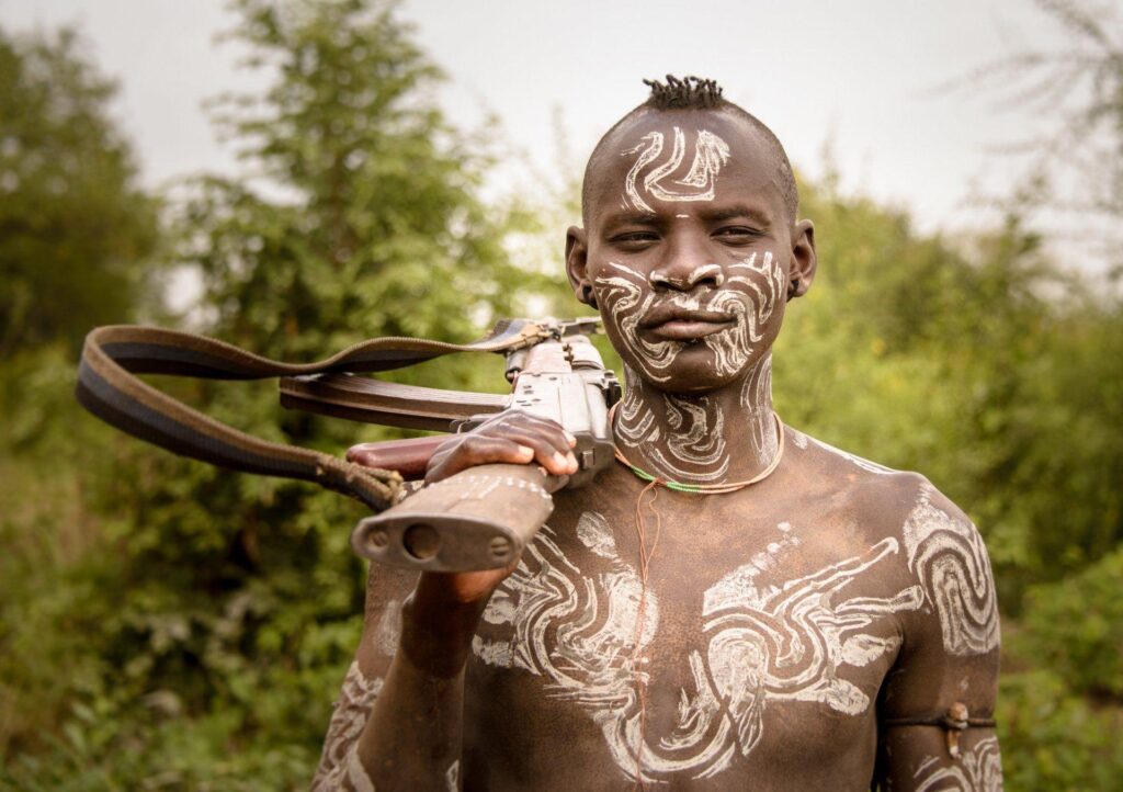 Mursi warrior omo wally ethiopia 2K wallpapers