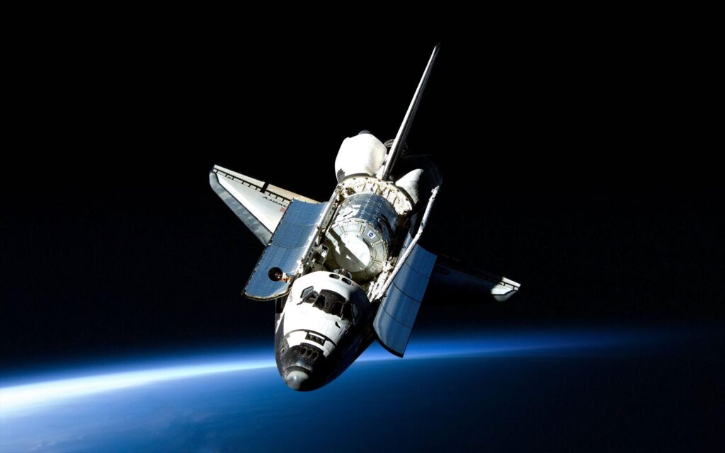 Space Shuttle Discovery posing for a great wallpaper space