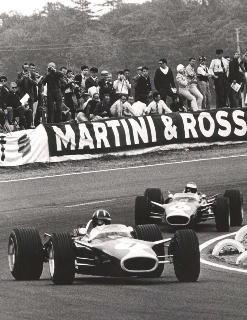 Jim Clark and Graham Hill dueling in their Lotus s during the