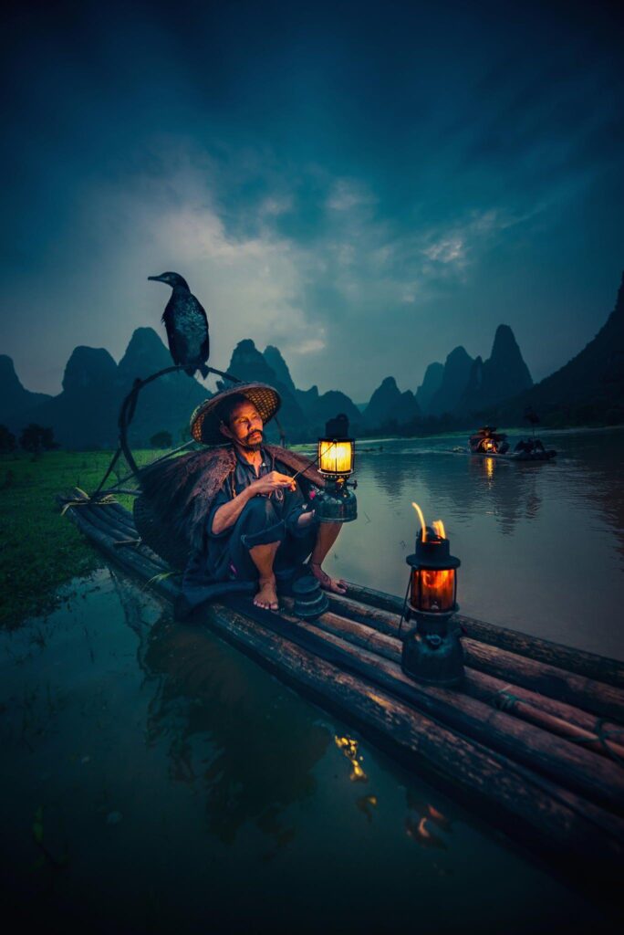 Cormorant Fisherman by Tom Anderson on px