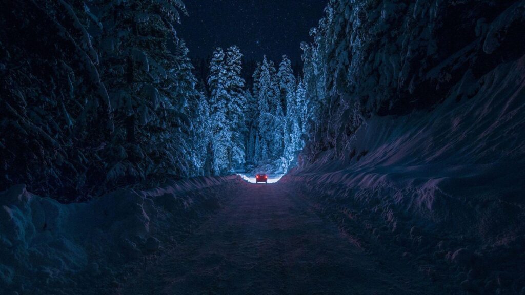 Driving Through The Snowy Forest 2K Aesthetic Wallpapers Free
