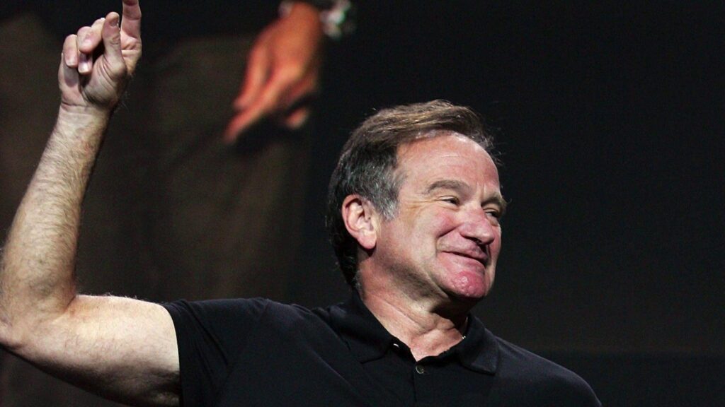 The famous Robin Williams shows his hand up wallpapers and Wallpaper
