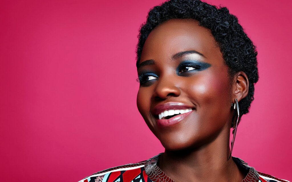 Lupita nyongo red backgrounds 2K Wallpaper