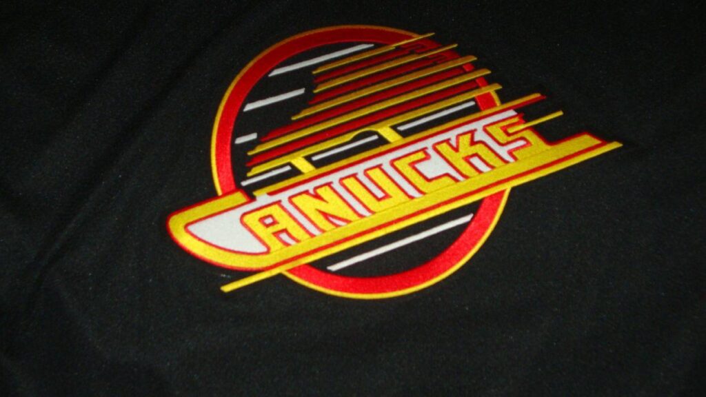 Vintage hockey NHL crest jersey skates Vancouver Canucks wallpapers