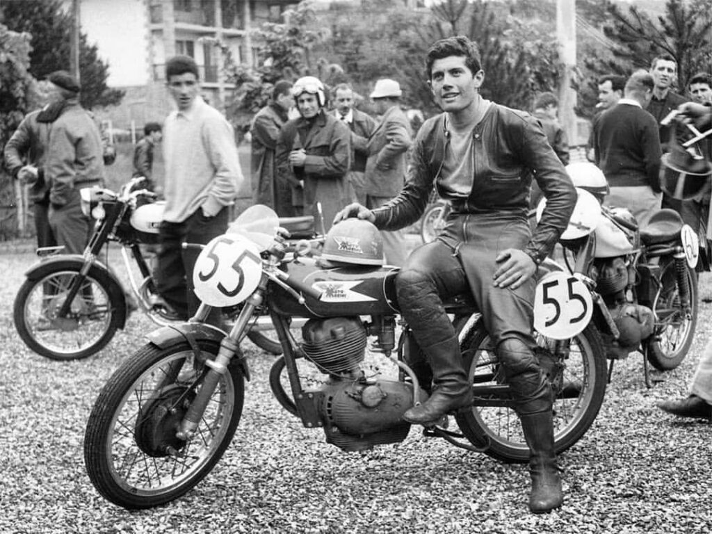 A young Giacomo Agostini with his cc Moto Morini prior a race in