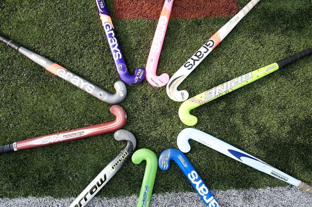 Wallpaper For – Field Hockey Stick And Ball