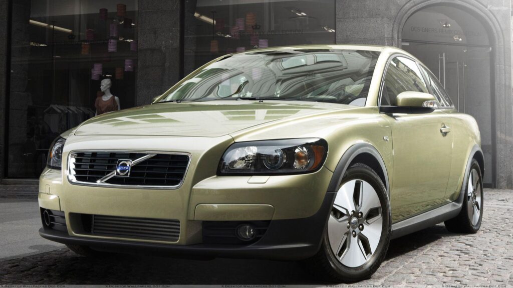 Volvo C In Green Front Pose Wallpapers