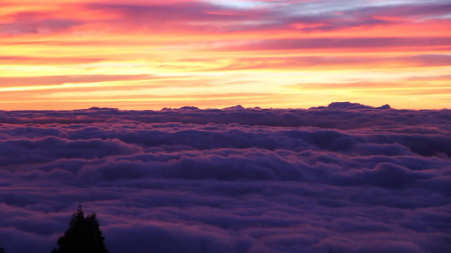 Epic Sunset Above the Clouds
