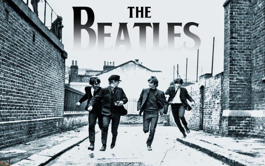 THE TH! THE BEATLES INVADES US; FEBRUARY ,