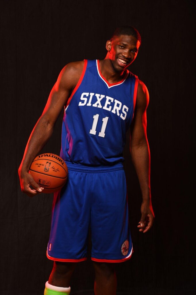Joel Embiid Dons Sixers Jersey for First Time At Rookie Photoshoot