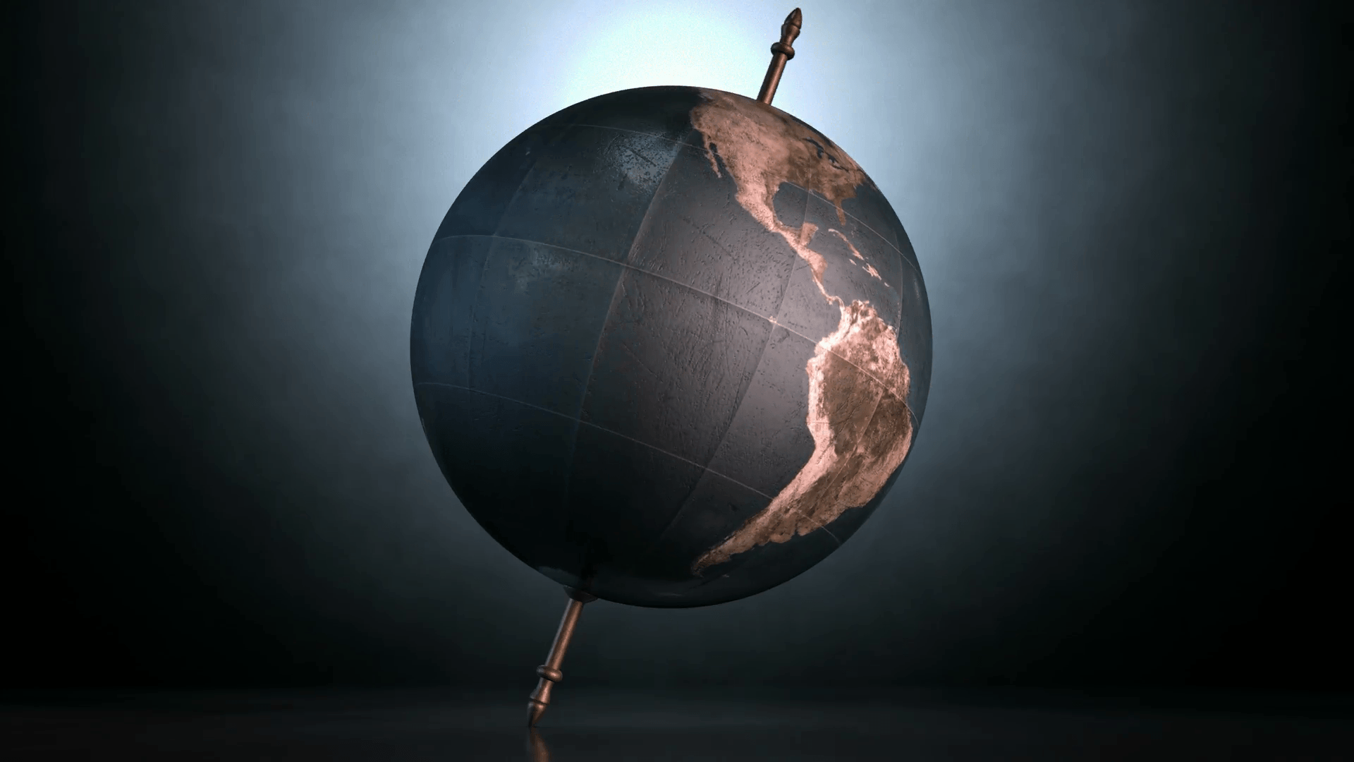 A static view of a world globe ornament spinning on a tilted axis on