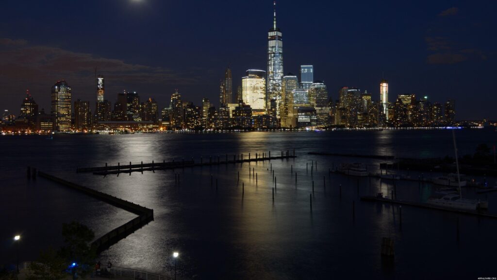 City cityscape night water lights reflection building skyscraper new