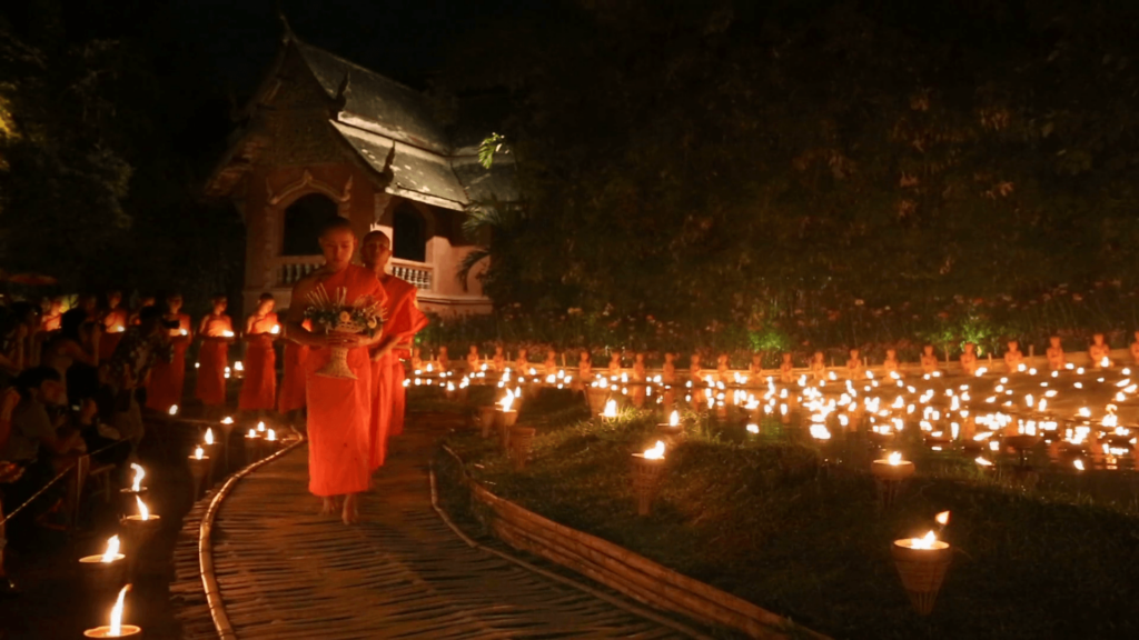 Magha puja day, Monks light the candle for buddha, Chiangmai