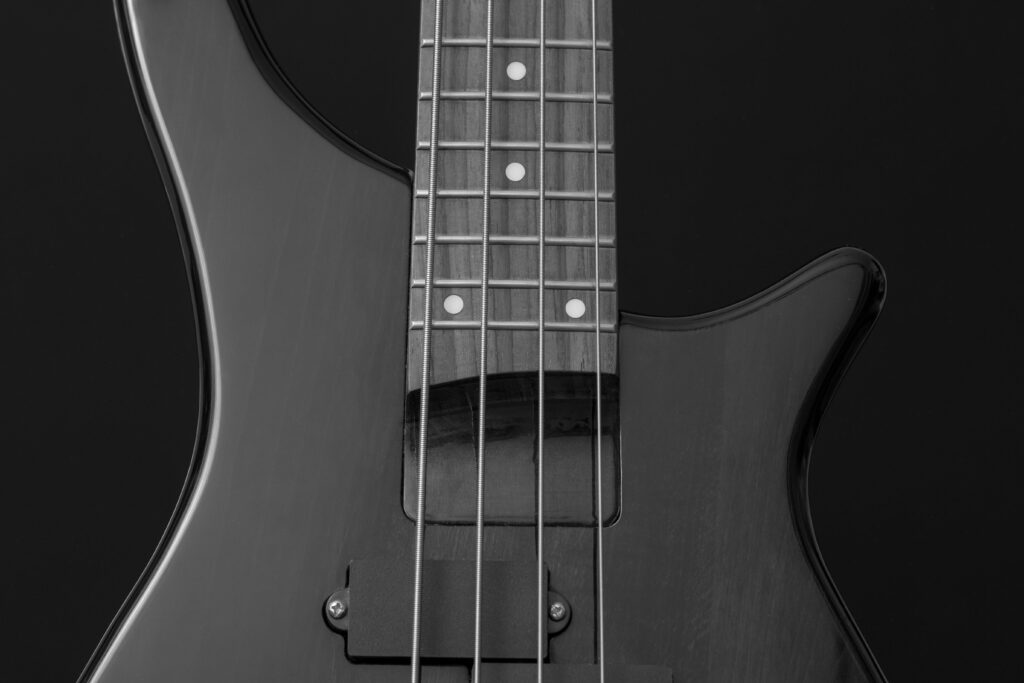 Black electric guitar with string 2K wallpapers
