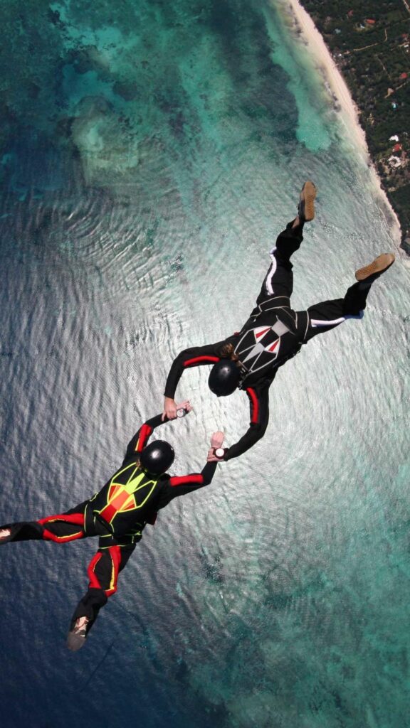 Skydiving Skydivers Parachuting Stunt Ocean 2K Wallpapers