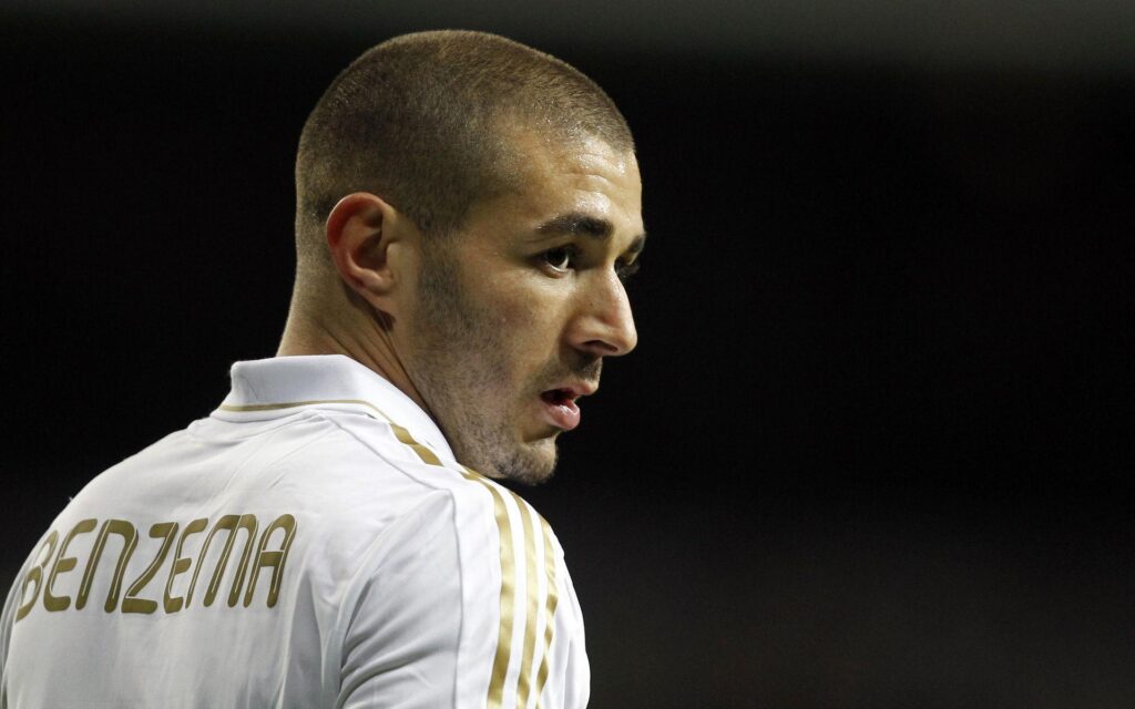 The player of Real Madrid Karim Benzema on the black backgrounds