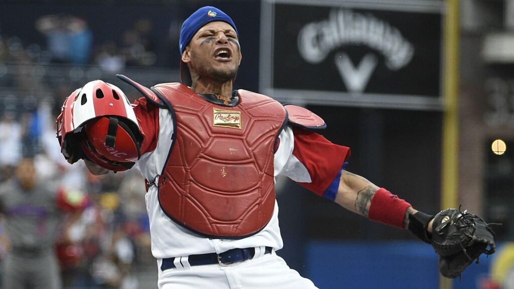 The internet wants to know how a ball got stuck to Yadier Molina’s