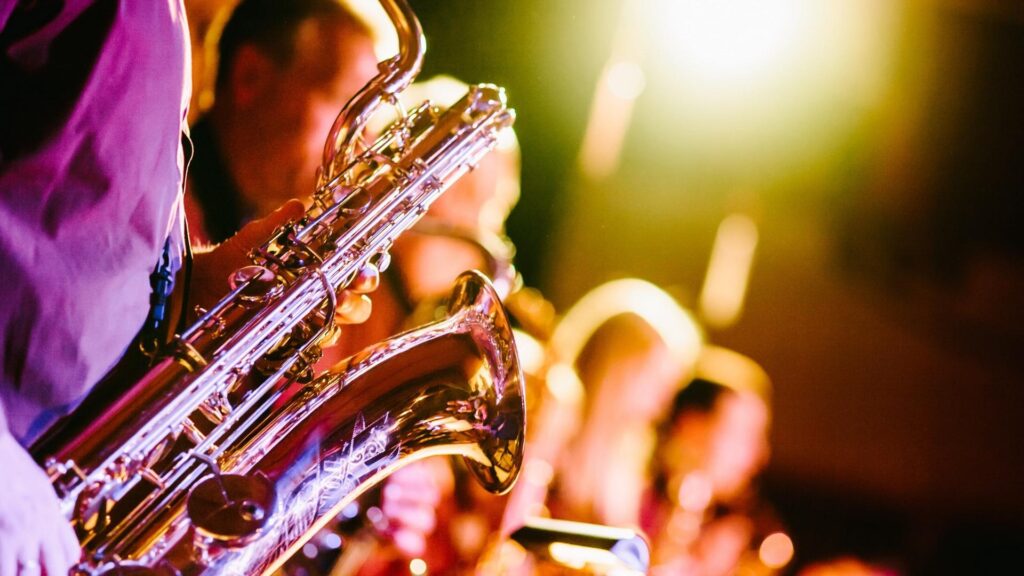 Download wallpapers saxophone, musical instrument, blur