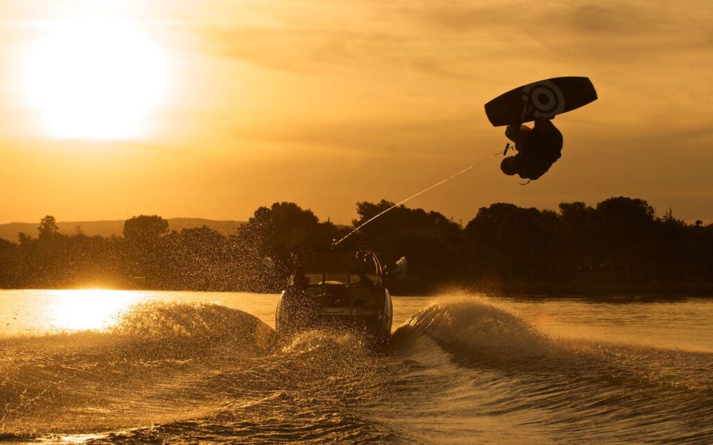 Wakeboarding At Sunset 2K Wallpapers and Backgrounds Wallpaper