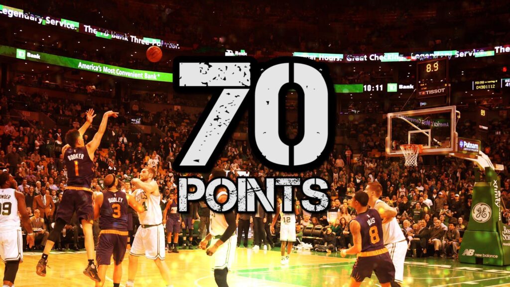 Devin Booker scores points in loss to Celtics