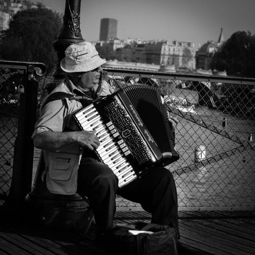 Man playing accordion gray scale photo free Wallpaper