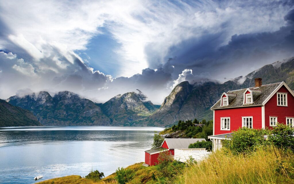 Beautiful house on a backgrounds of mountains in Norway wallpapers