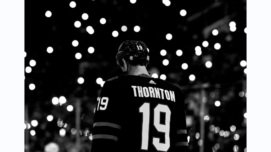 Joe Thornton of the San Jose Sharks stands for a moment of
