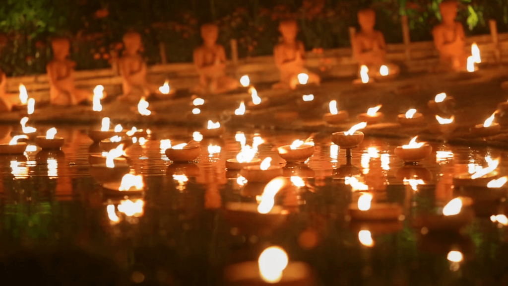 Magha puja day, Monks light the candle for buddha, Chiangmai