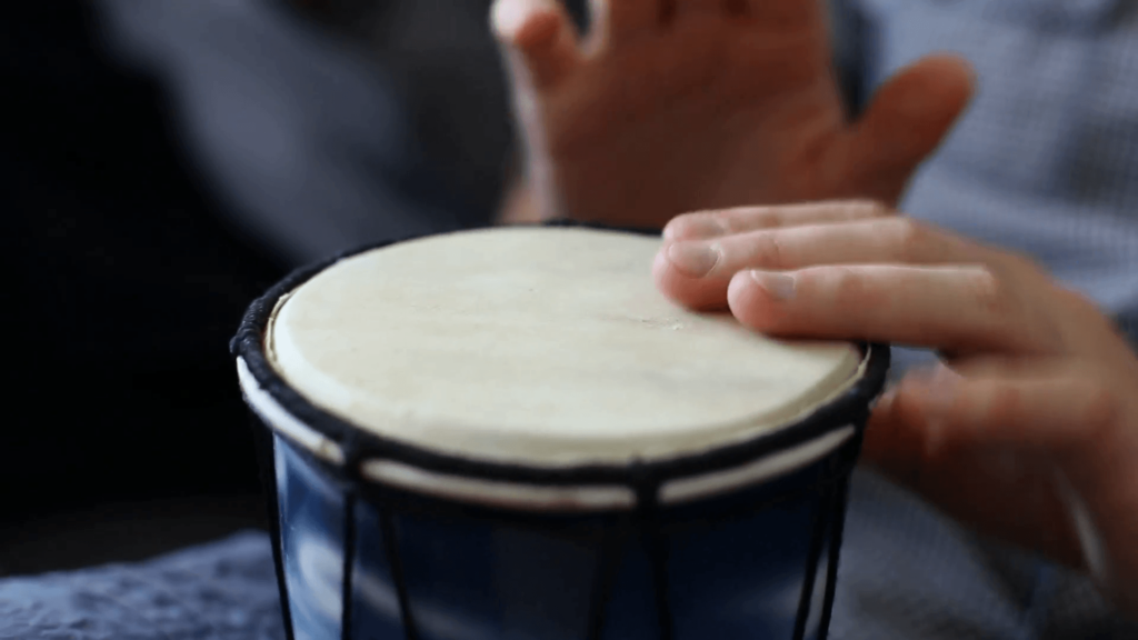 Playing Bongo drum close up 2K stock footage Hand tapping a Bongo