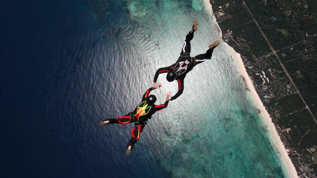 Download wallpapers skydivers, parachuting, stunt