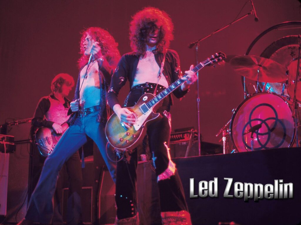 Led Zep in concert on stage and Plant