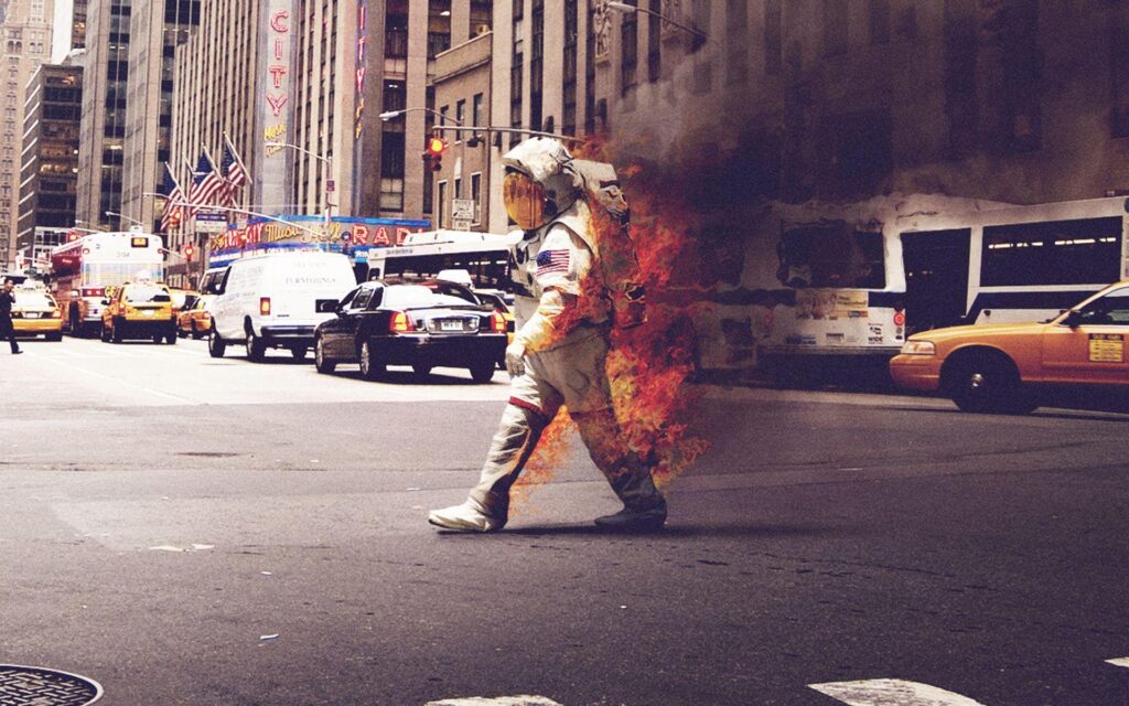 Astronaut on Fire walking down a street wallpapers