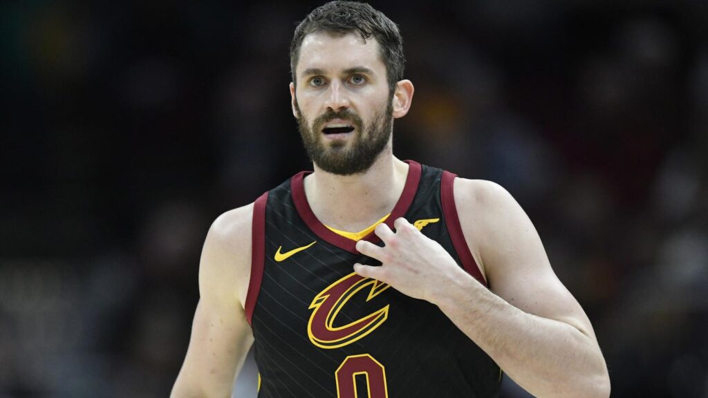 Kevin Love leaves after taking elbow to the face