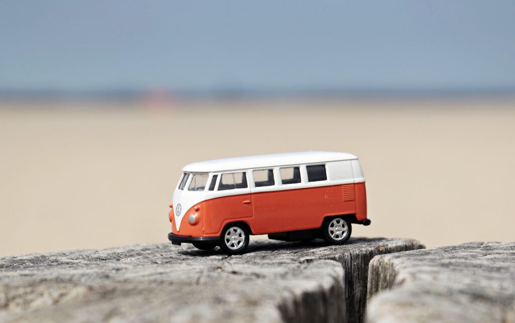 Selective focus photography of orange and white bus 2K wallpapers