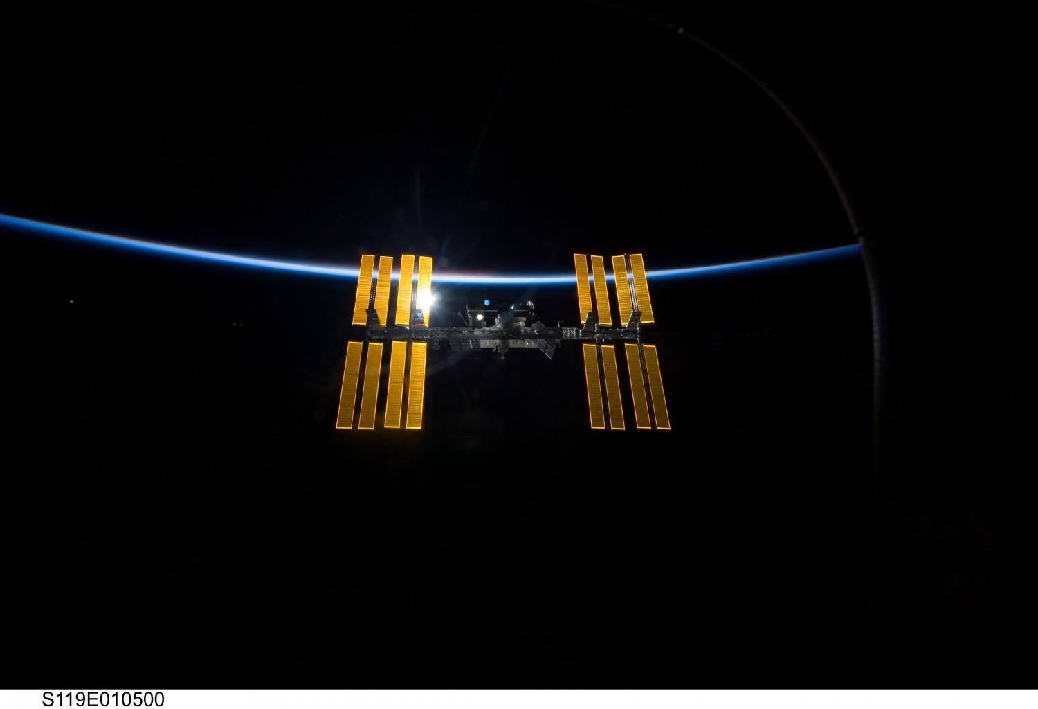 Crew of three docks at International Space Station