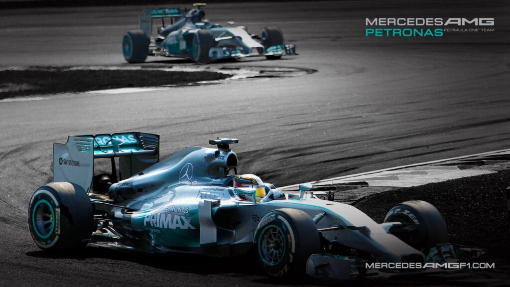 Formula One Mercedes AMG Petronas Moving Desk 4K Wallpapers