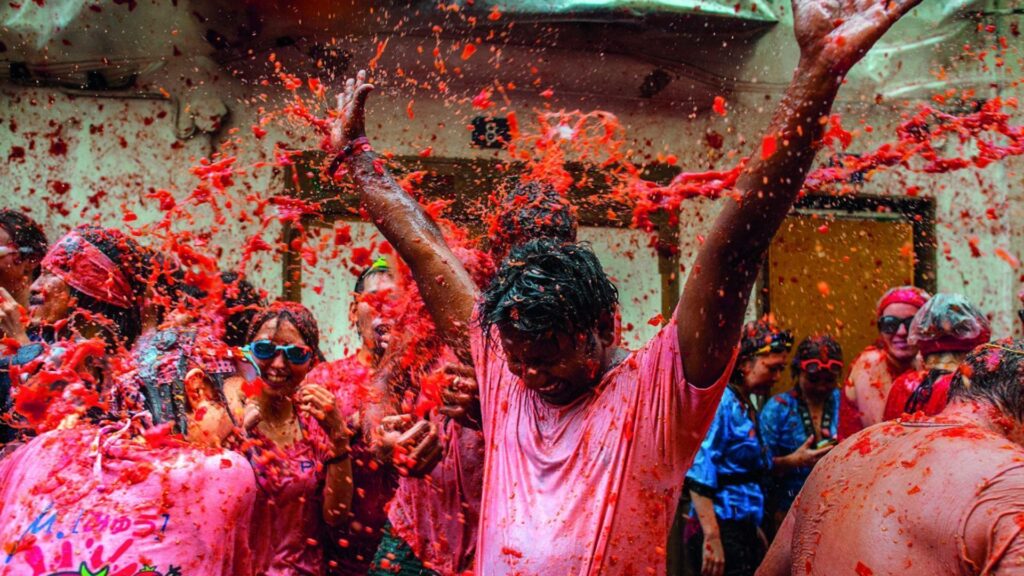 Spain Tomatina festival celebrated with tomatoes fights