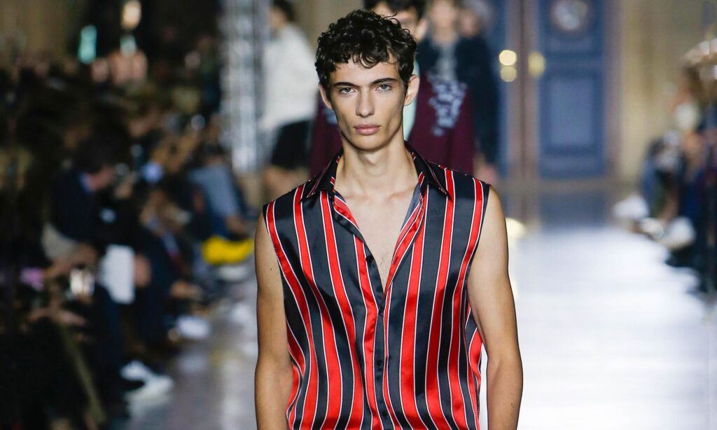 Male model, Piero Mendez, walking the catwalk at Givenchy SS m