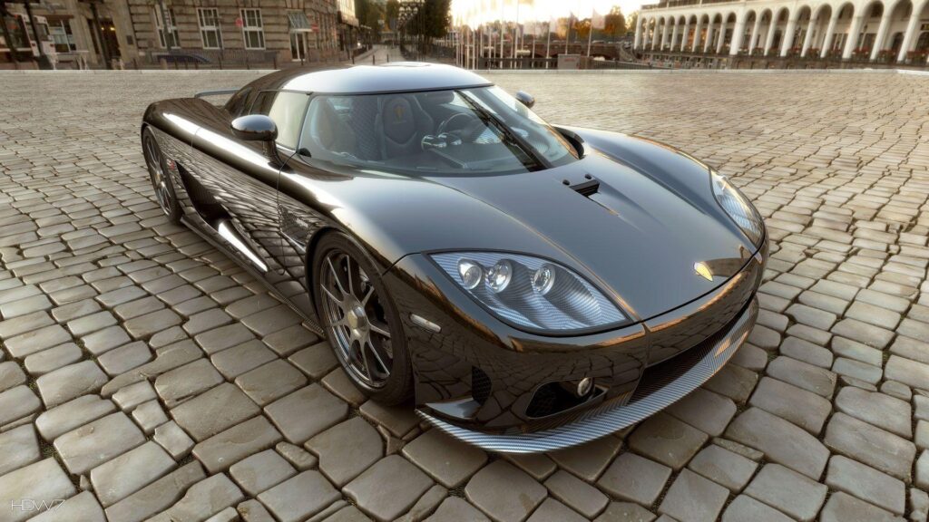 Koenigsegg ccr super sports car on a pavement wallpapers