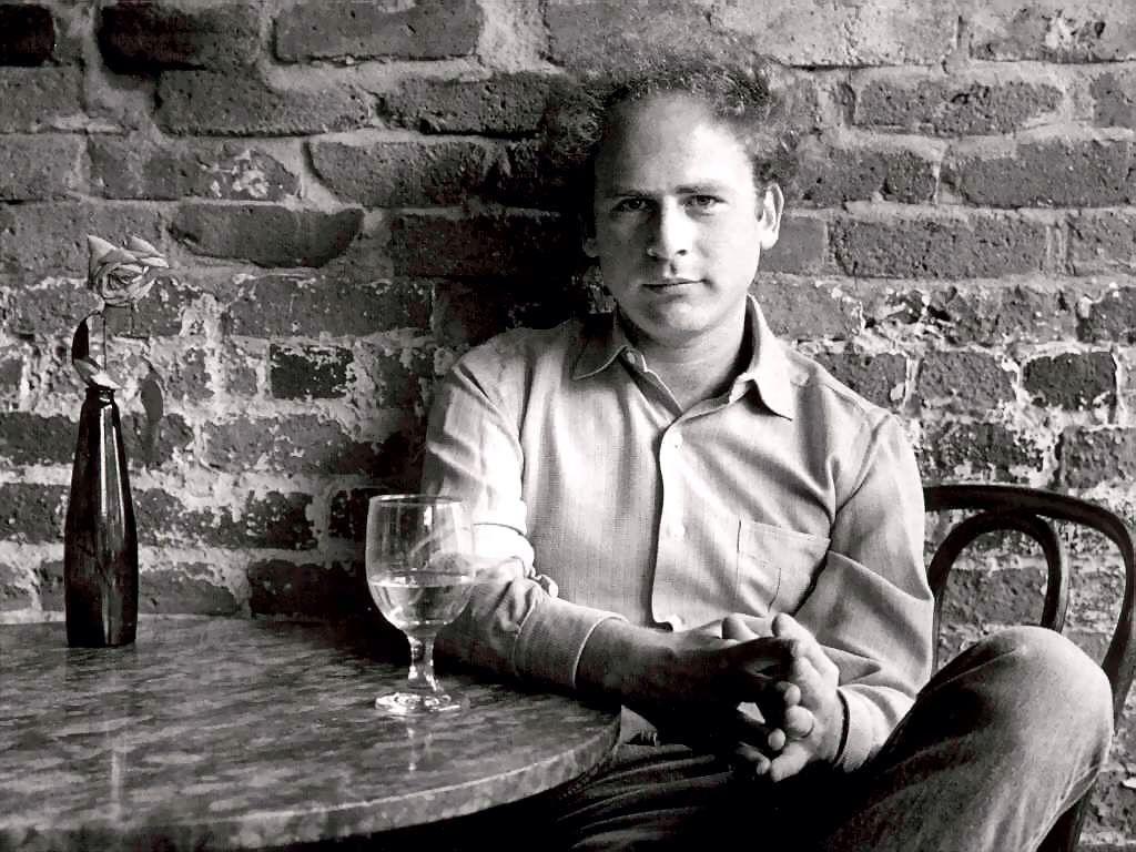 Art Garfunkel having a glass