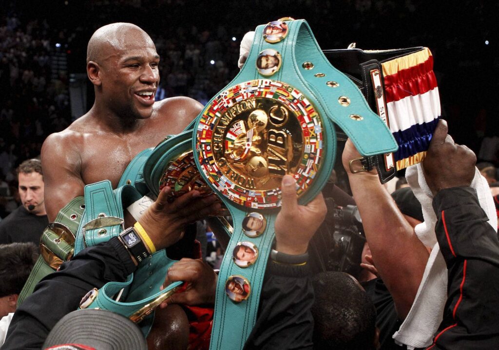 Boxer Floyd Mayweather Jr and his prizes wallpapers and Wallpaper