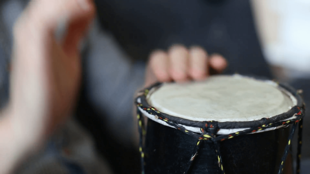 Playing Bongo drum close up 2K stock footage Hand tapping a Bongo