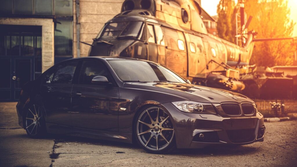 Black BMW E With A Helicopter Wallpapers