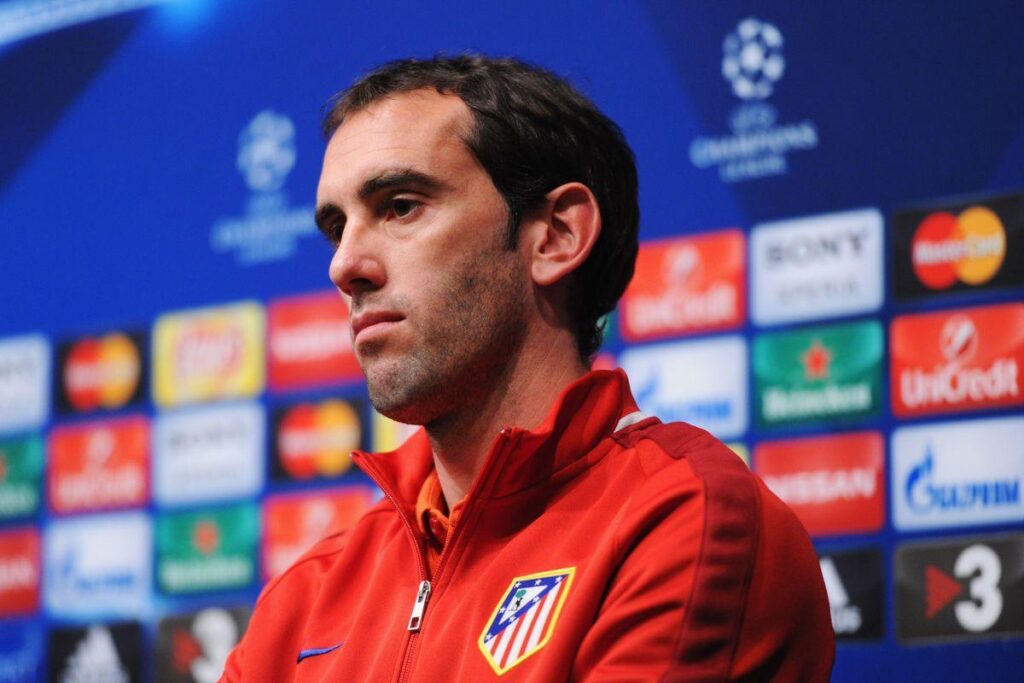 Diego Godin removed from Atletico Madrid match with hamstring injury